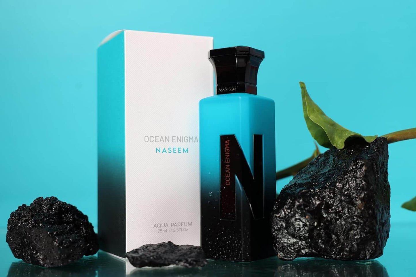 Naseem Ocean Enigma perfume bottle with box on a blue background, showcasing its luxurious fragrance.