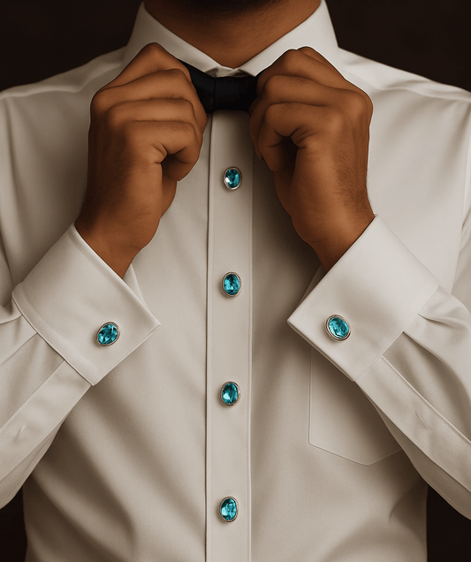 Luxury tuxedo shirt studs featuring 22K gold gemstones on a white dress shirt.