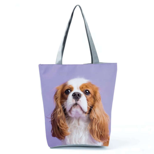 Puppy Dog Face Tote Bag featuring a Cavalier King Charles Spaniel on a lavender background.