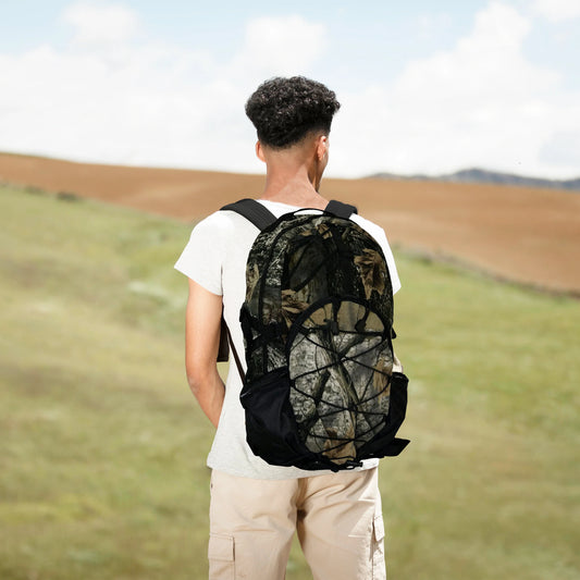 Camo Hunting Backpack with large storage capacity worn by a person in an outdoor setting.