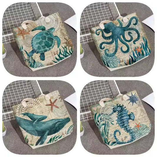 Octopus tote bag for women featuring ocean design with turtle, octopus, whale, and seahorse illustrations.