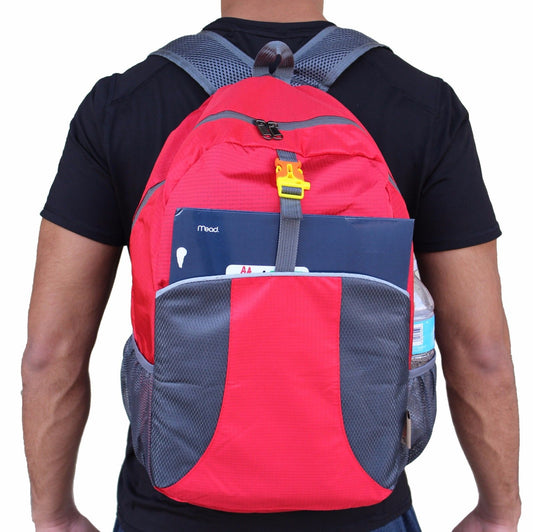 Man wearing a red packable travel backpack with gray accents, ideal for daily use and outdoor activities.